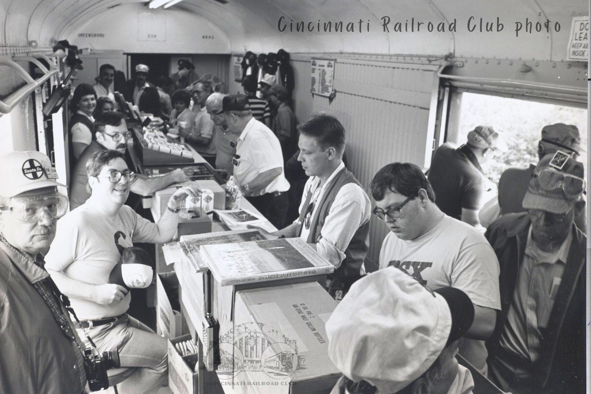 Cincinnati Railroad Club members working in the club car during steam excursion trip