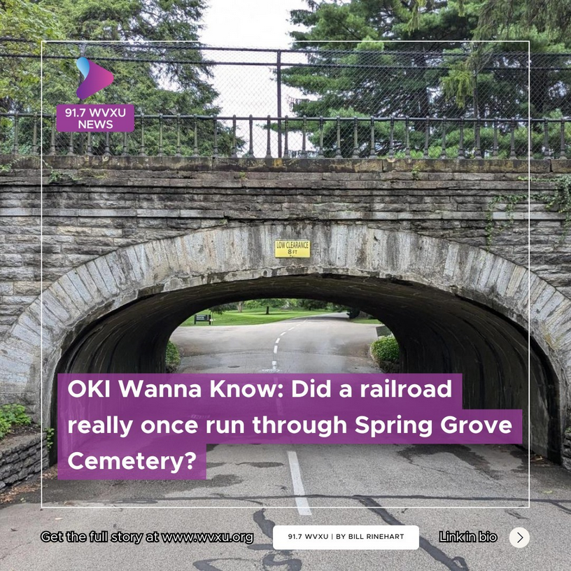 photo of stone arch railroad overpass at Spring Grove Cemetery in Cincinnati OH. Clicking the photo takes you to the WVXU website to listen to or read the article about whether the railroad went through the cemetery in the past.